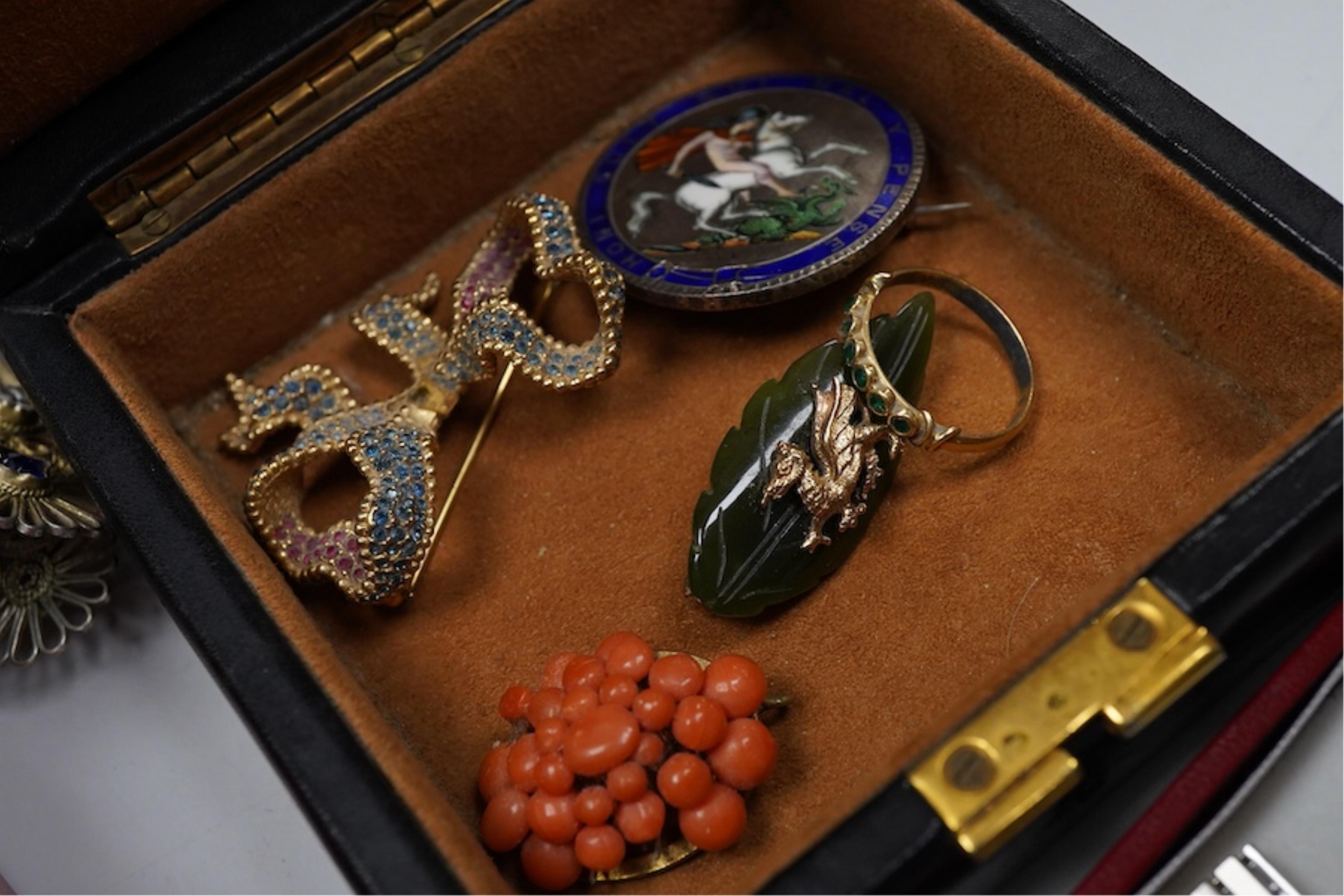 A collection of jewels, comprising: a three-coloured cultured pearl necklace; a graduated cultured pearl necklace; a pair of cultured pearl earrings, screw fittings, stamped 9CT; a silver necklace of textured linking, Br
